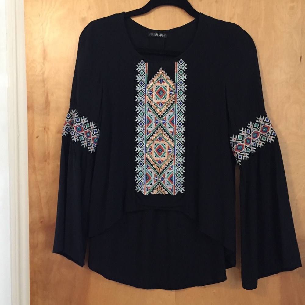 Blouse with embellished stitching